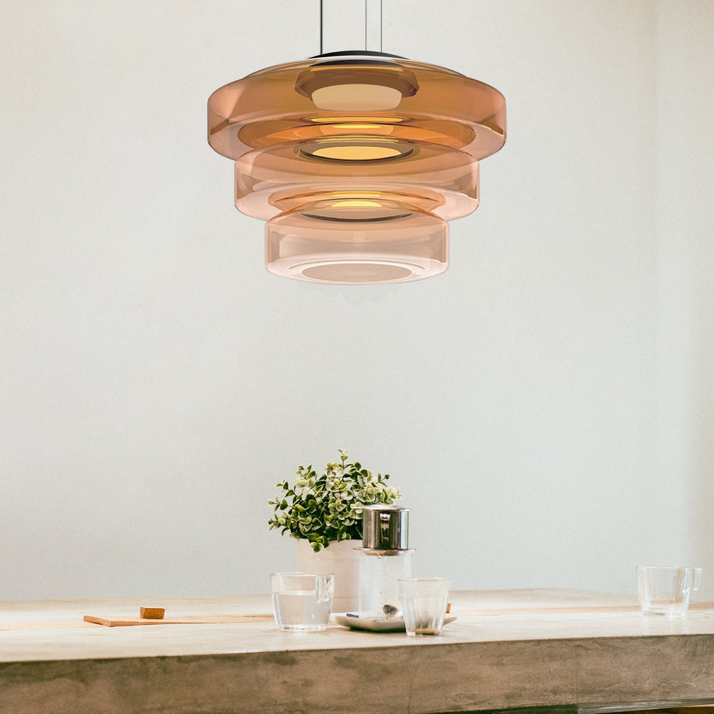 "Bauhaus style glass pendant light with sleek design enhances modern home decor, ideal for kitchens and living spaces."