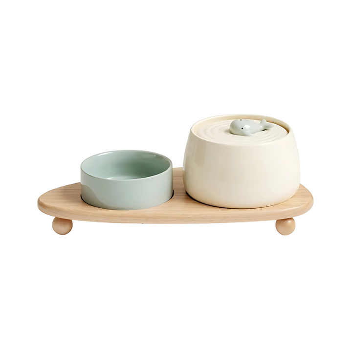 Durable ceramic pet water bowl in green, featuring an automatic dispenser and silent pump for filtered clean water.