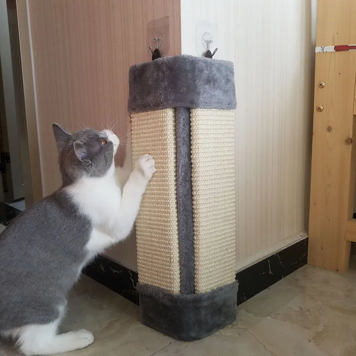 Beige wall-mounted cat scratching board with soft cover. Durable pet scratcher protects furniture from feline claws.
