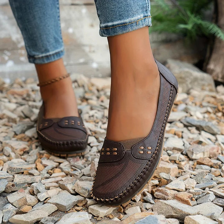 Orthopedic slip-on shoes for women in light pink, a comfortable and casual footwear option