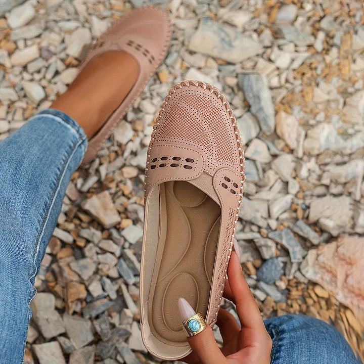 Women's beige orthopedic slip-on footwear, offering casual style and ergonomic support