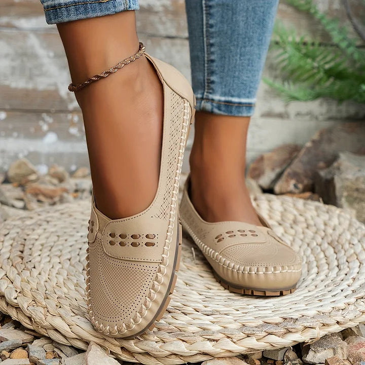 Comfortable women's orthopedic slip-ons in light pink, stylish and supportive for everyday