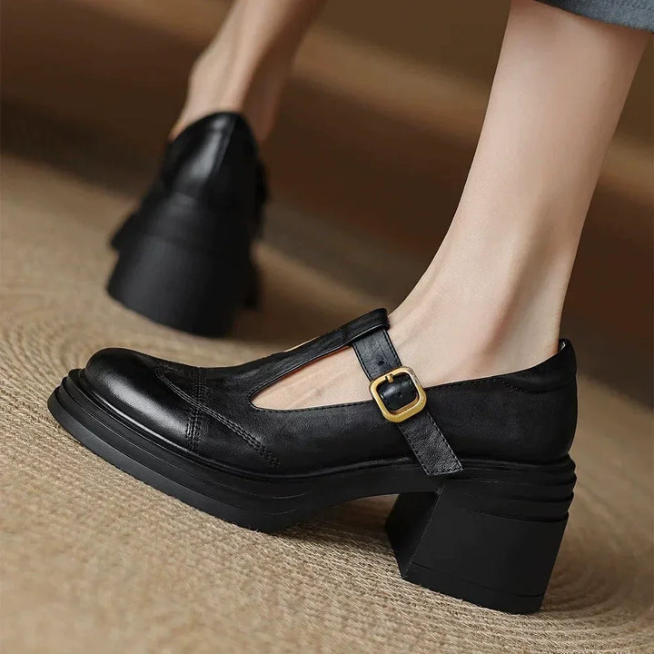 Black classic leather T-strap block heel shoes for women, elegant and comfortable dress shoes.