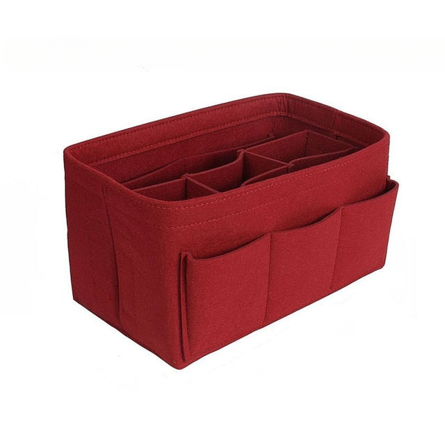 Women's felt handbag organizer with multiple pockets, an essential bag accessory for storage.