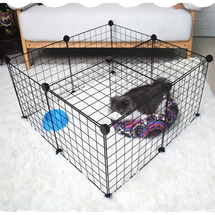 Black flexible wire dog playpen with secure door for indoor/outdoor pet safety. Ideal puppy pen.