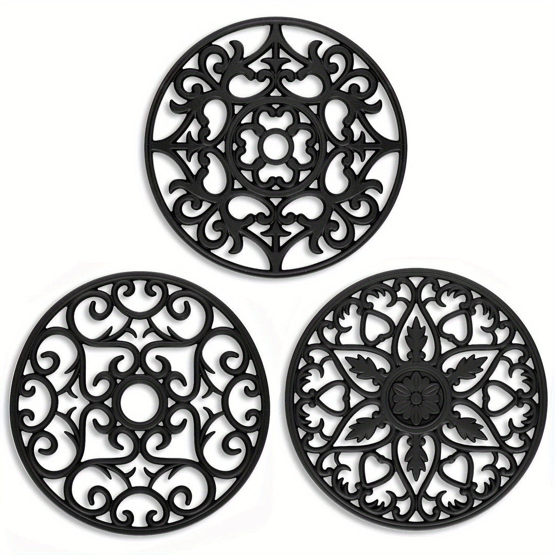 Black heat-resistant silicone trivet set for kitchen protection, non-slip mat for dining table & countertop.