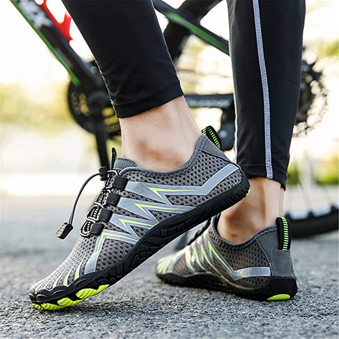 Grey men's barefoot shoes, minimalist design, wide fit for outdoor adventures.