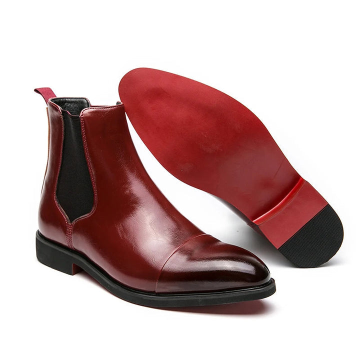 Durable men's classic slip-on Chelsea boots with cap toe. Versatile black or red formal/casual footwear.