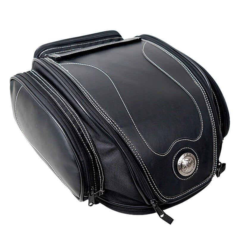 Black water-resistant motorcycle tail bag with expandable storage, perfect for touring and travel.