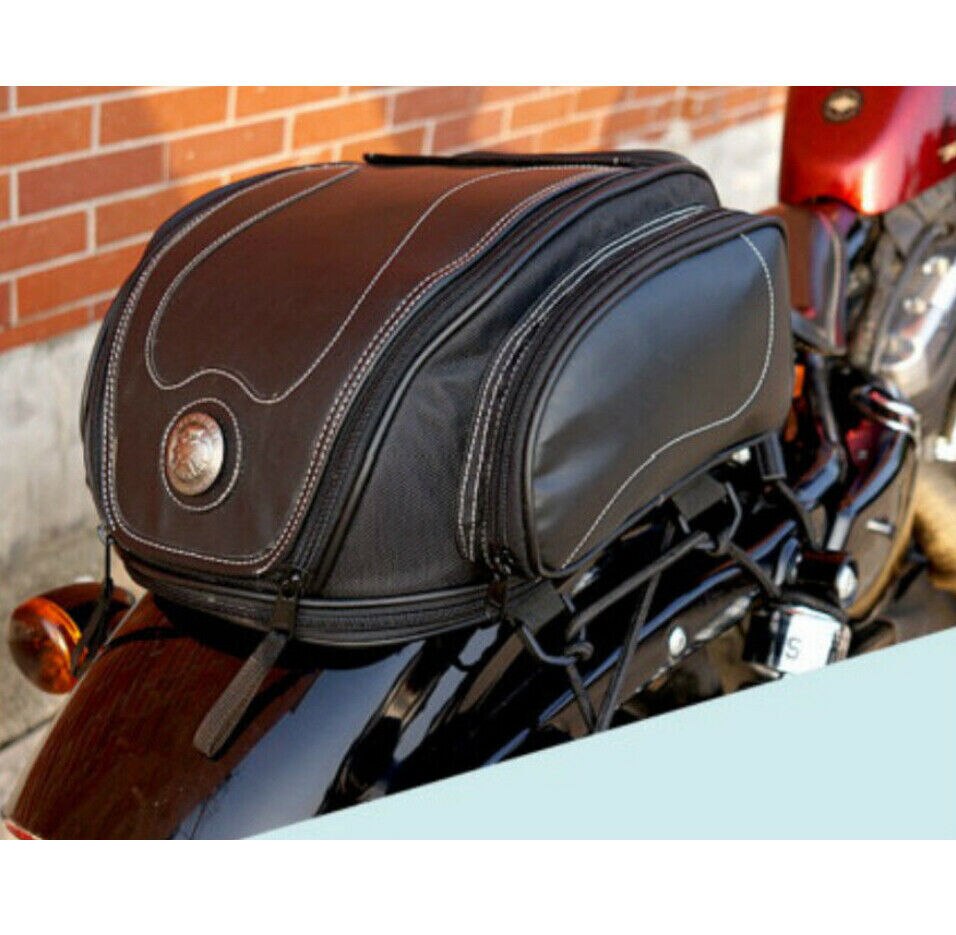Sleek black motorcycle tail bag, water-resistant and durable, designed for secure bike luggage storage.