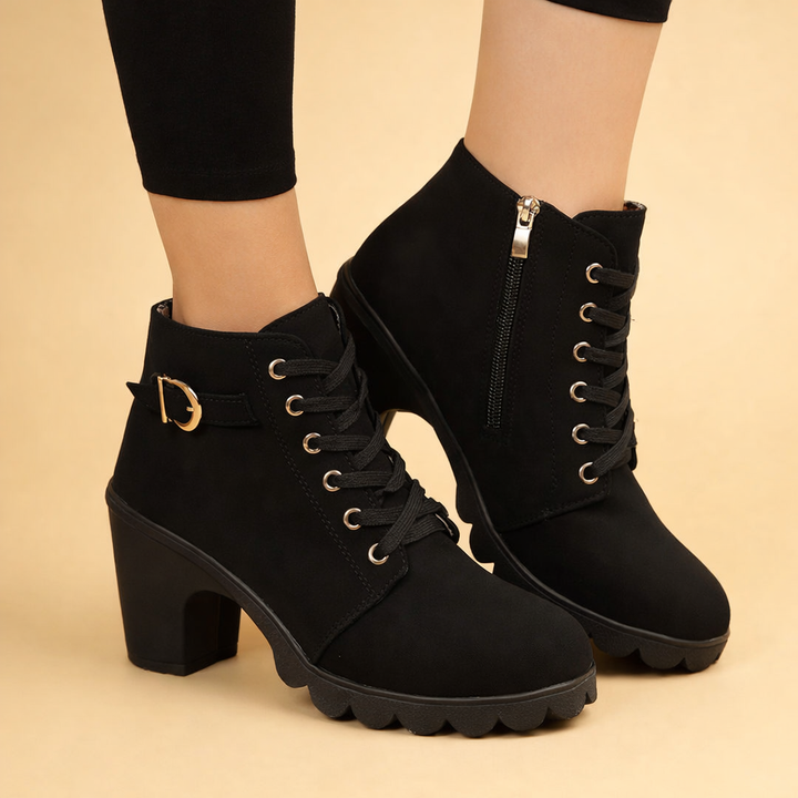 Black women's edgy chunky heel lace-up ankle boots with buckle detail, perfect for fall and winter fashion.