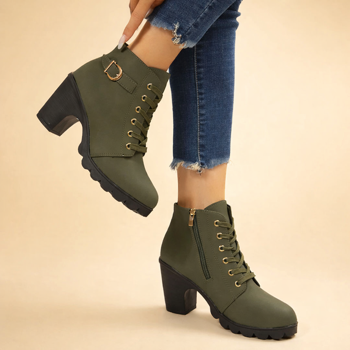 Stylish women's chunky heel platform ankle boots, lace-up design with edgy buckles, ideal winter fashion footwear.