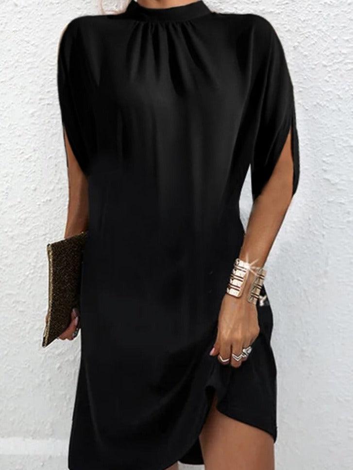 Black women's modern mock neck mini dress with stylish slit sleeves, perfect for evening wear & chic style.