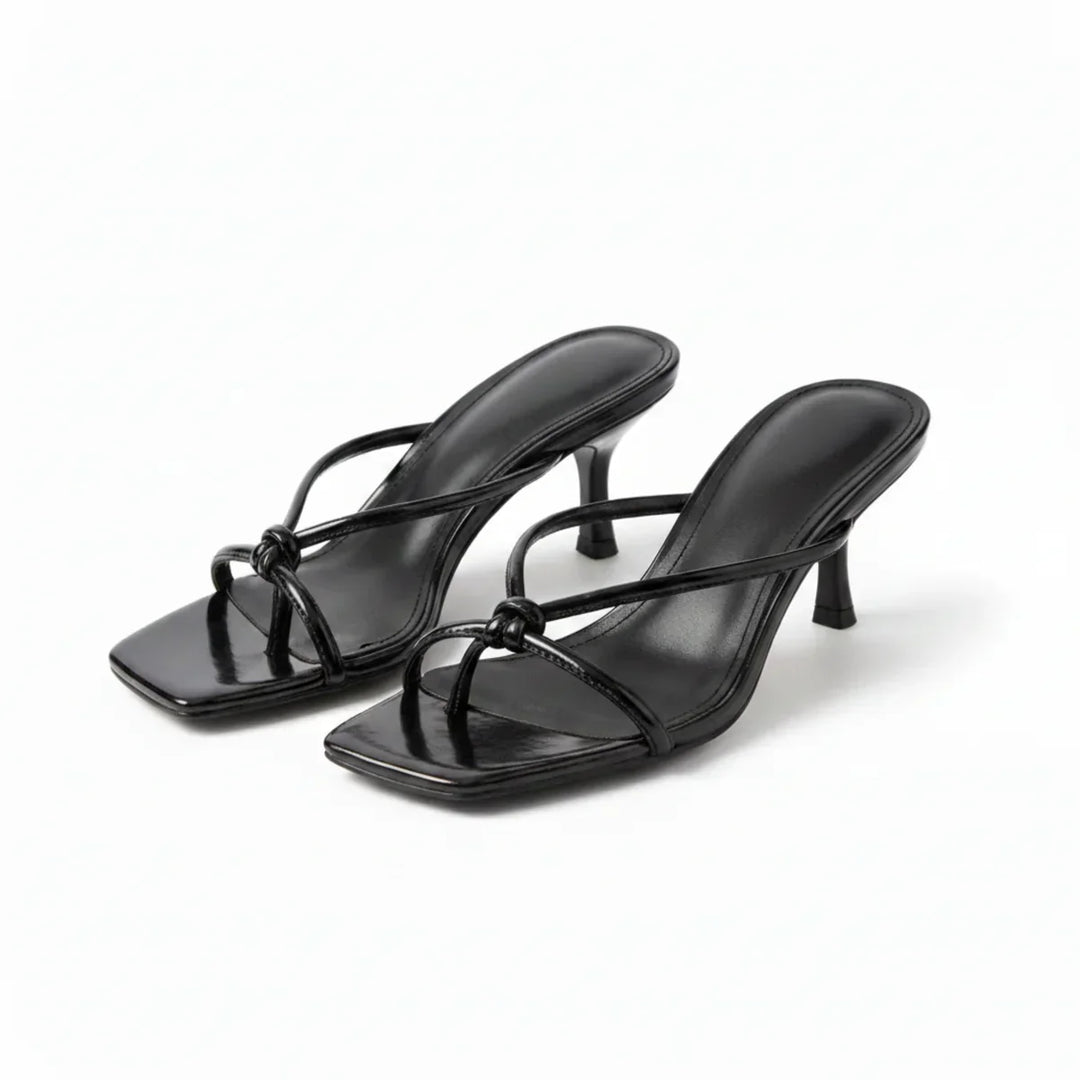 Fashionable women's heeled knot sandals, offering elegance & comfort for summer events and casual chic.