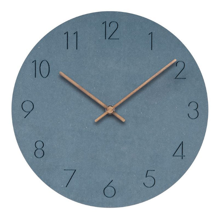 Green minimalist silent wood wall clock, elegant Scandinavian design for stylish home decor.