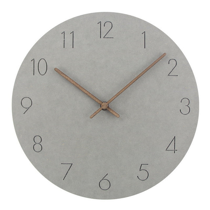 Orange decorative silent wall clock, modern round Scandinavian wood for a vibrant home style.