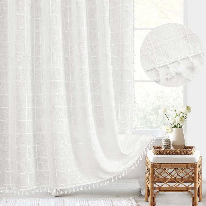 Bohemian farmhouse waterproof linen shower curtain with tassels, perfect for stylish bathroom decor.