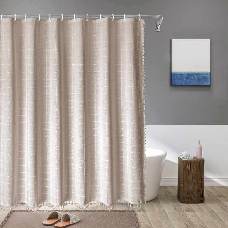 Soft linen-look waterproof shower curtain in bohemian farmhouse style for bathroom decoration.