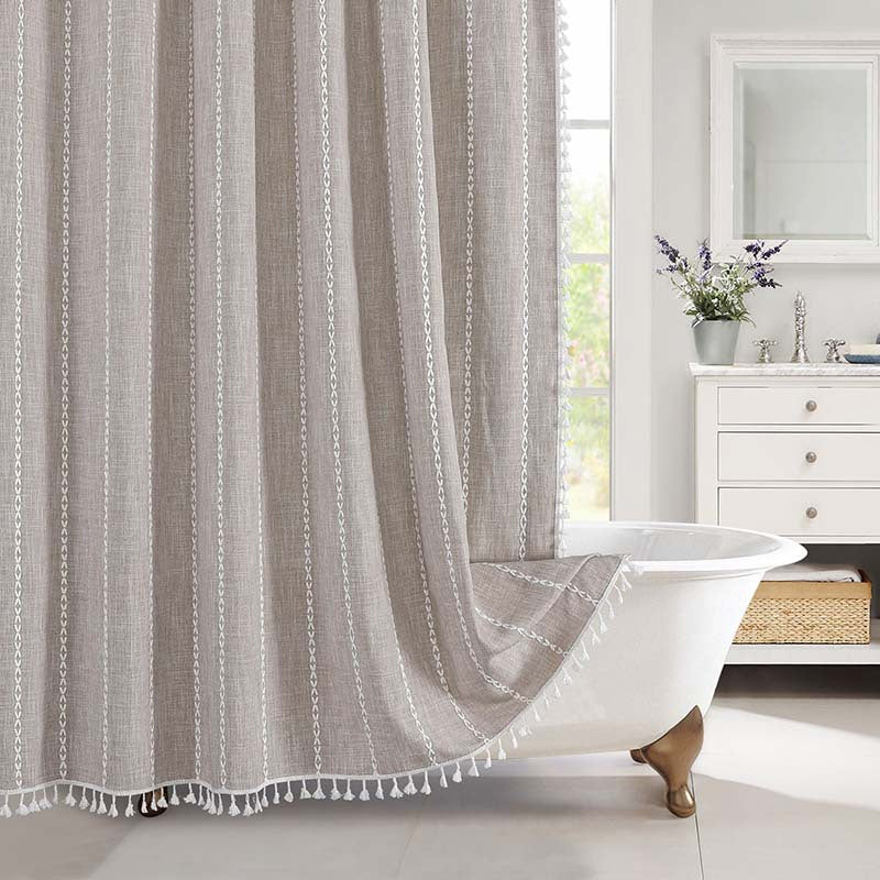 Stylish bohemian farmhouse waterproof linen shower curtain, enhancing rustic bathroom home decor.