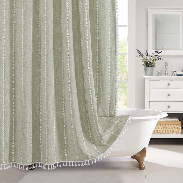 Close-up of waterproof linen texture on a bohemian farmhouse shower curtain for bathroom elegance.