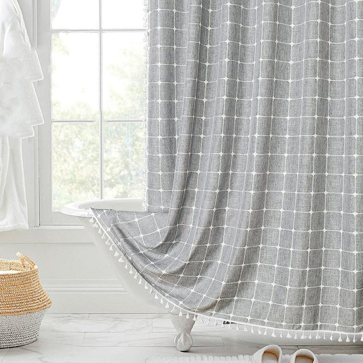 Neutral tone bohemian farmhouse waterproof linen shower curtain with tassels, great bathroom accent.