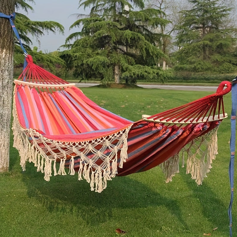 Close-up of the stylish tassels & striped pattern on the comfortable cotton bohemian hammock.