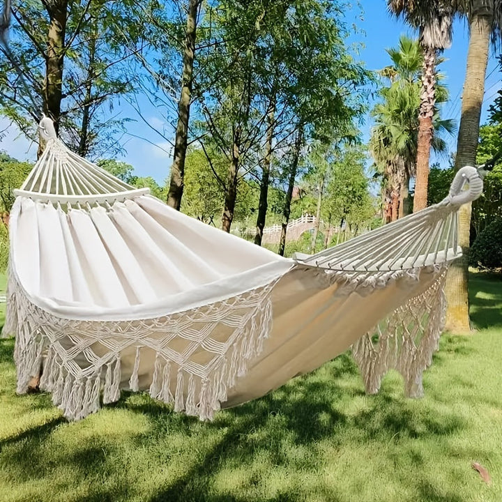 Tusheng Bohemian Tassel Hammock with vibrant stripes, ideal for indoor decor & relaxation. Cozy cotton.