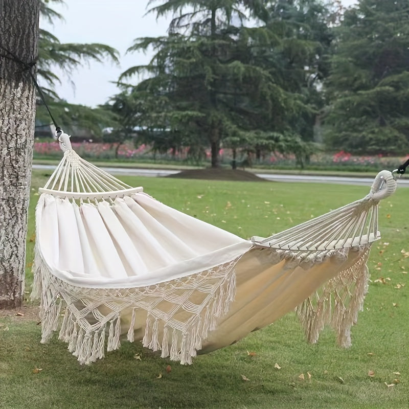 Double Bohemian Tassel Hammock, offering ultimate relaxation & comfort for your outdoor living space.