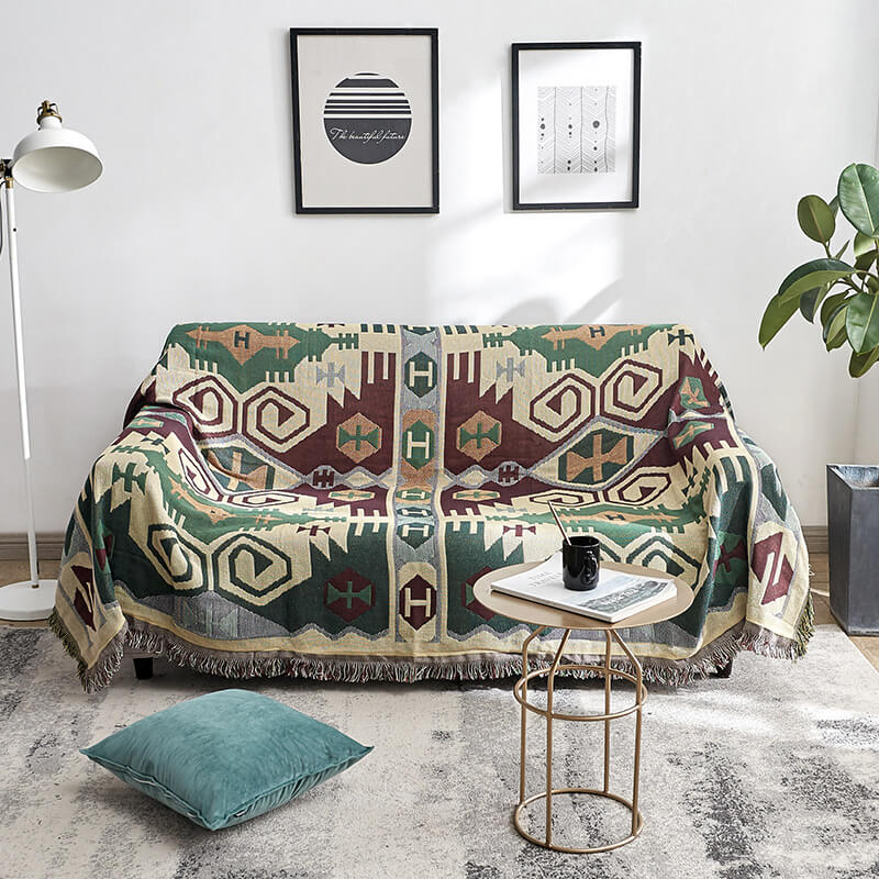 Decorative bohemian throw blanket with tassels, soft cotton blend.