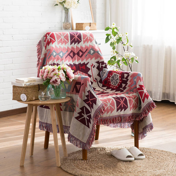 Bohemian knitted sofa throw, reversible for versatile home decor.
