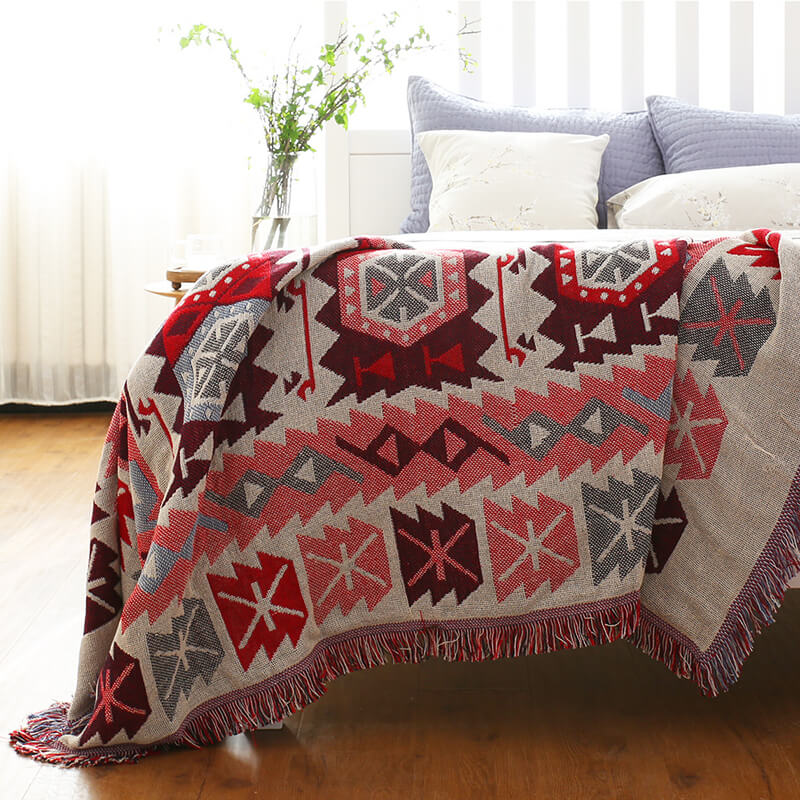 Fringed bohemian throw blanket, a cozy & stylish addition to any space.