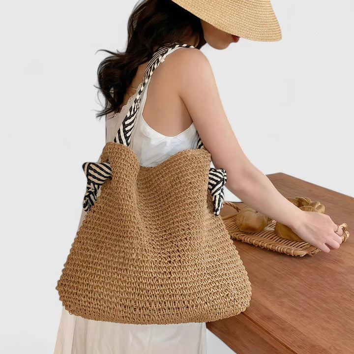 Women's everyday shoulder bag in a stylish bohemian design and durable woven material.