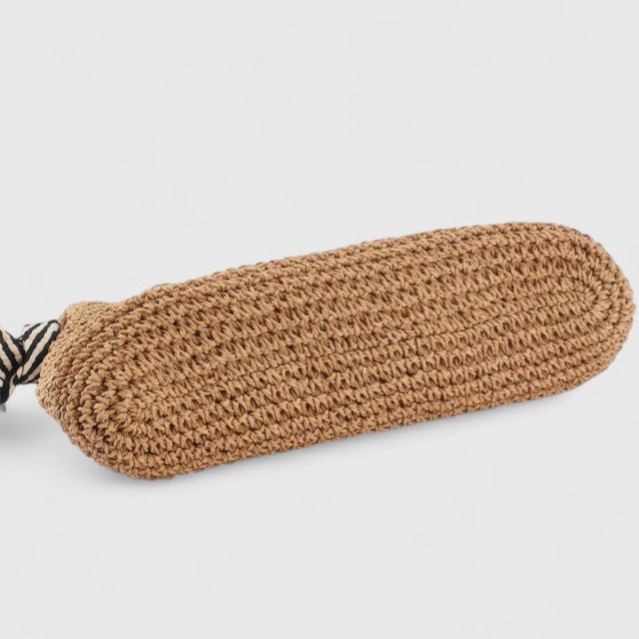 Close-up of a bohemian-style shoulder bag showing its unique woven texture and design.