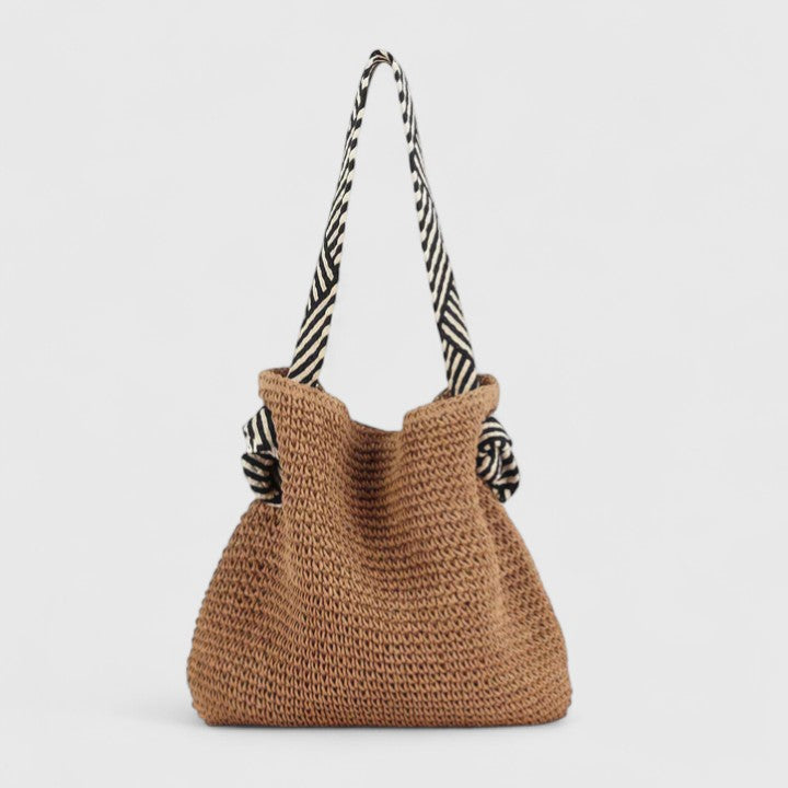 Everyday women's shoulder bag with a spacious interior, embodying bohemian chic.
