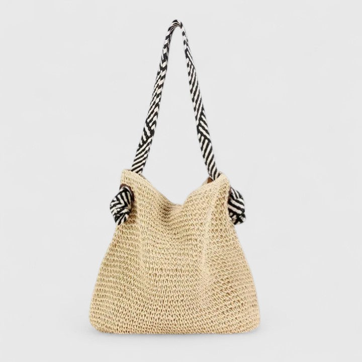 Bohemian travel shoulder bag, a trendy fashion accessory for summer and casual looks.