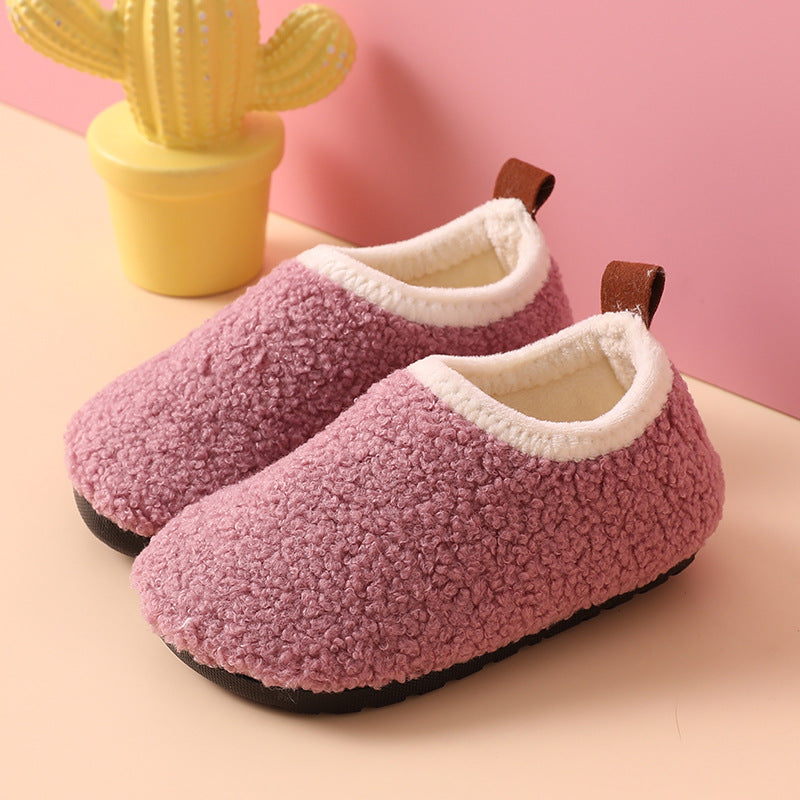 Boys' cozy winter slippers with non-slip sole for warm and safe indoor play. Perfect children's footwear.