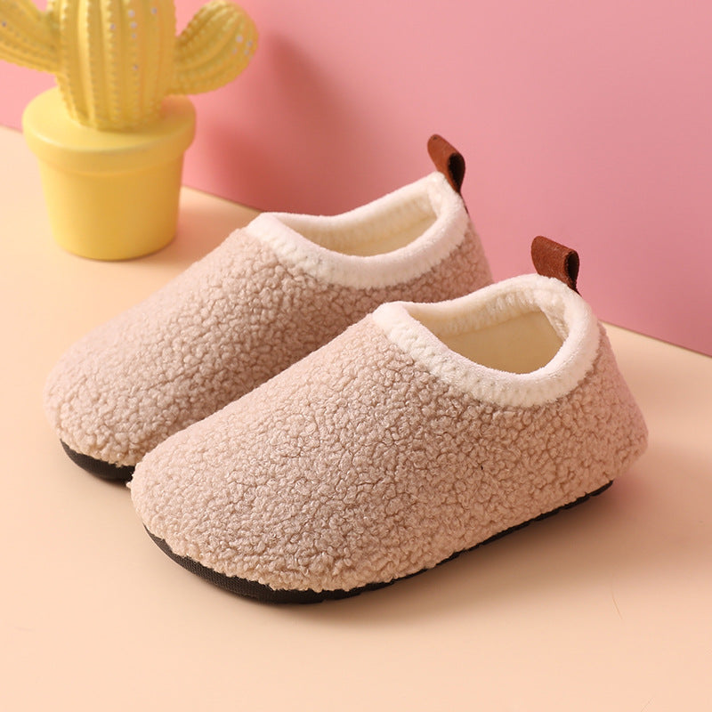 Cozy boys' indoor slippers for warm feet this winter. Non-slip design ensures comfort and safety for kids.