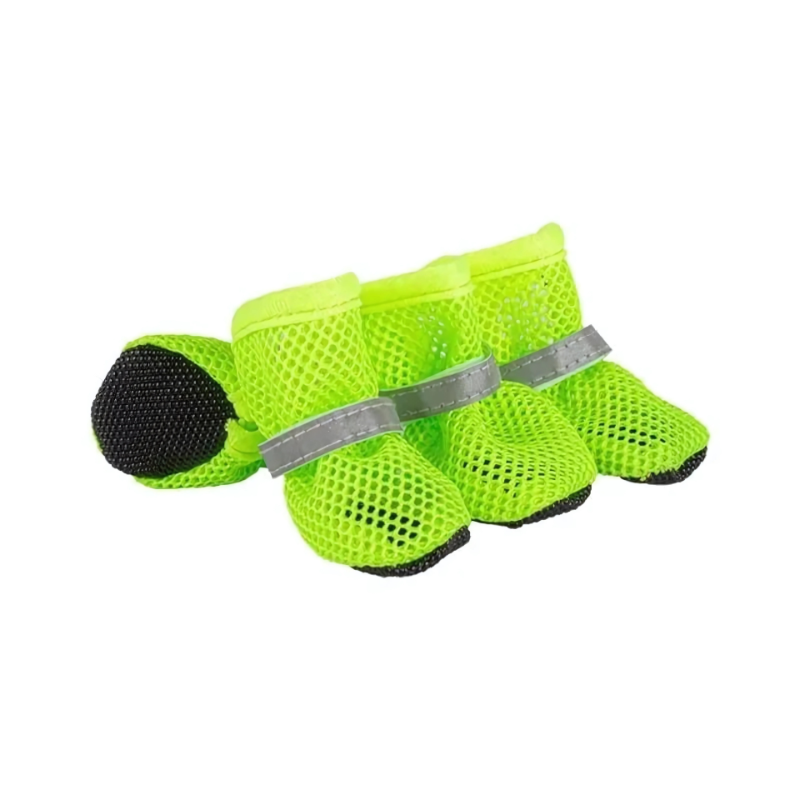 Reflective dog boots with breathable mesh for enhanced visibility and paw protection during all-terrain night walks.