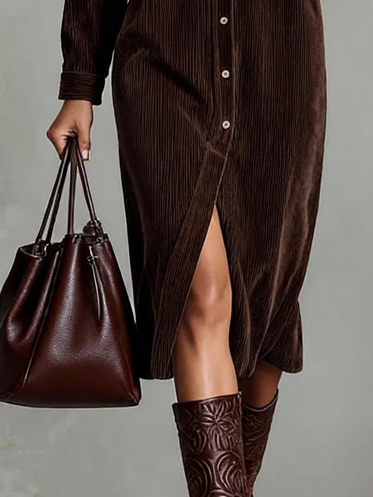 Detail of the buttons on a women's caramel corduroy midi dress, showcasing quality craftsmanship.