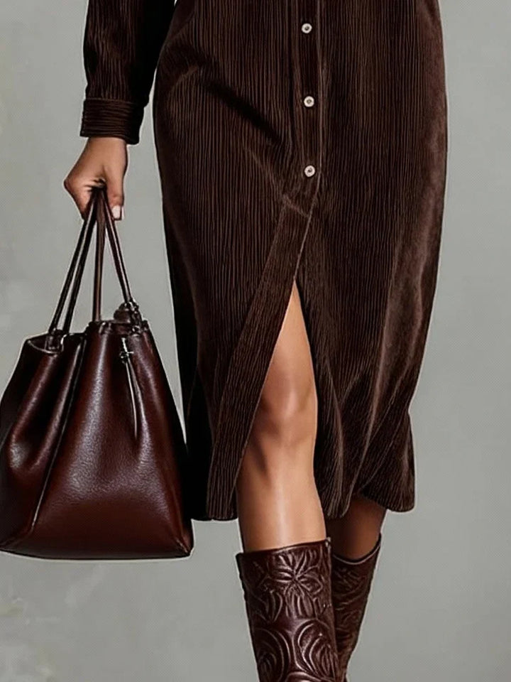 Detail of the buttons on a women's caramel corduroy midi dress, showcasing quality craftsmanship.