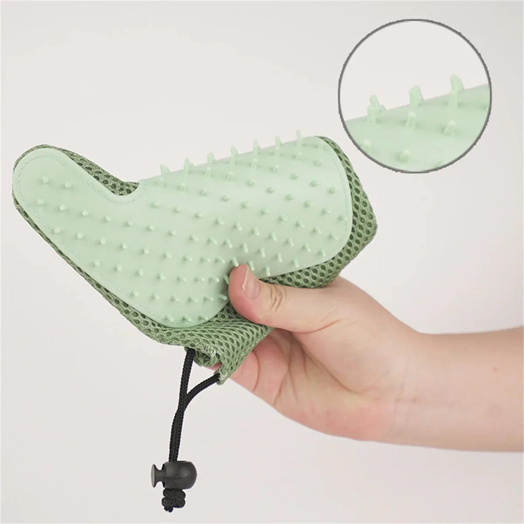 Unisex grooming glove for cats, designed for gentle deshedding, effective fur removal, and soothing pet massage.