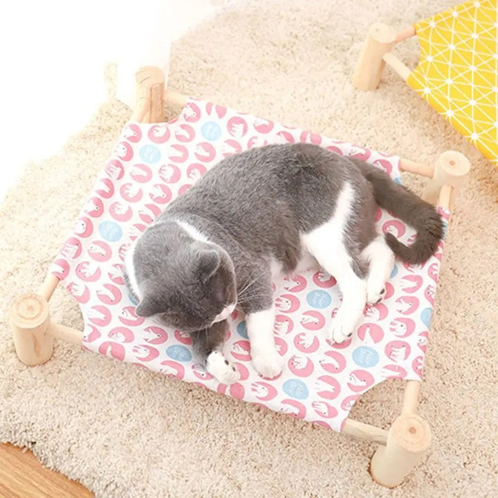 Breathable mesh cat bed, elevated pet furniture for feline comfort.
