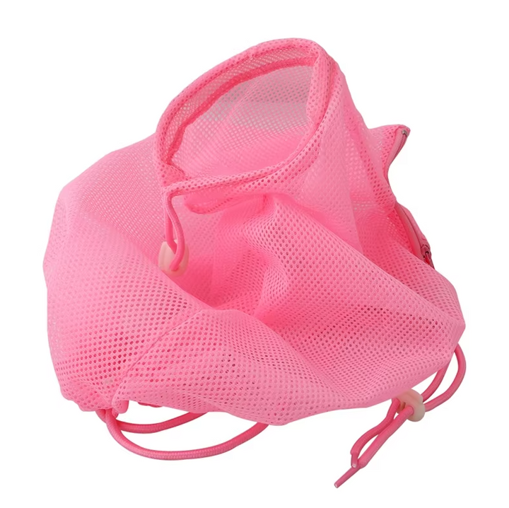 Owner gently bathing a cat using a specialized grooming bag for calm pet care & stress-free feline grooming.