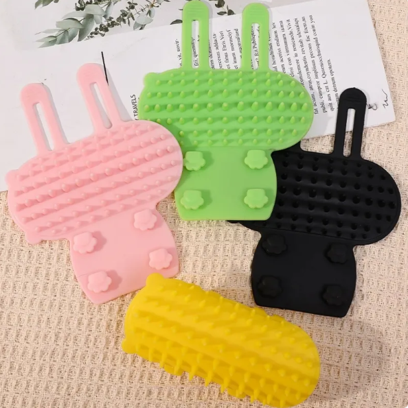 Cat's gentle silicone scratching brush for itch relief & grooming. Soft bristles for comfortable pet care.