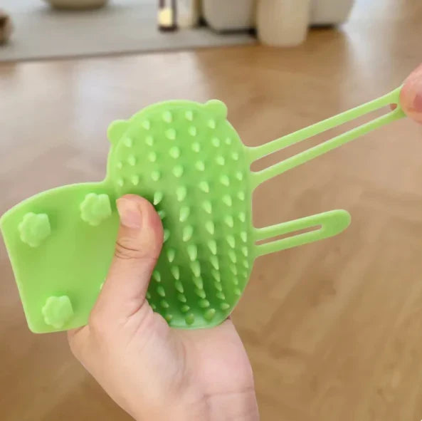 Cat's comfort silicone scratching brush. Essential pet care accessory for itch relief & grooming.