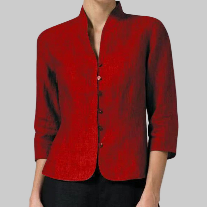 Versatile women's chambray blouse featuring a stand collar and 3/4 sleeves, ideal for modern workwear.