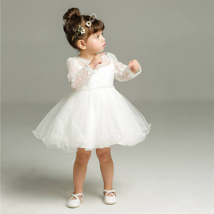 Charming girls' polka dot tulle ceremony dress. Elegant special occasion party wear for toddlers & baby girls.