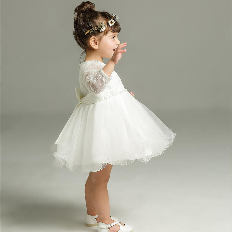 Toddler & baby girls' enchanting polka dot tulle ceremony dress. Ideal for elegant party wear outfits.