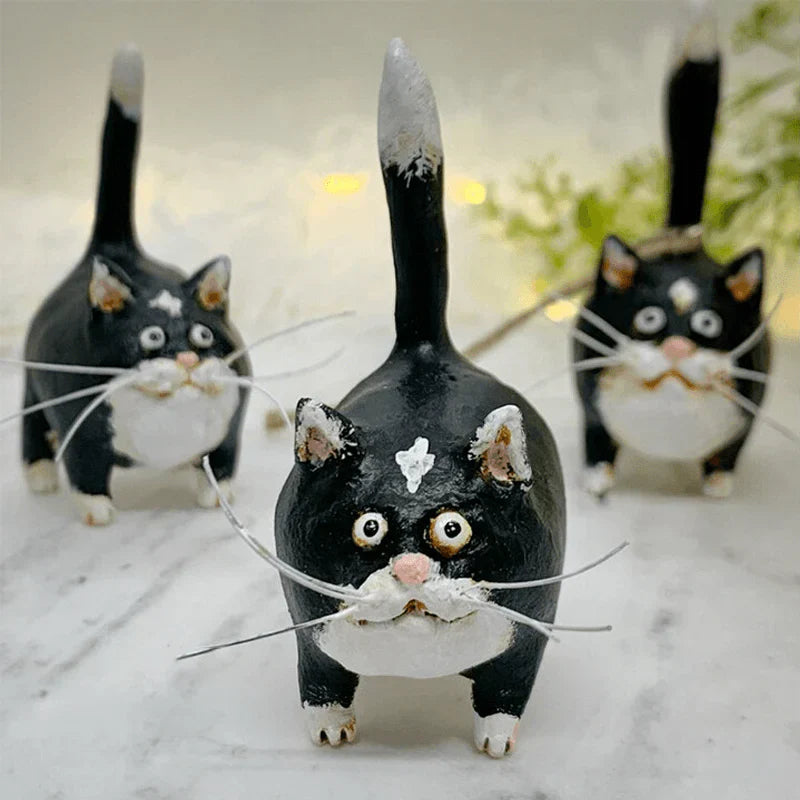 Intricate handmade cat ornament, a festive tree decoration. Perfect unique holiday decor for animal lovers.