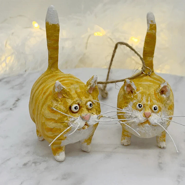 Handcrafted cat Christmas tree ornament. Adds unique charm & festive holiday decor to any home.